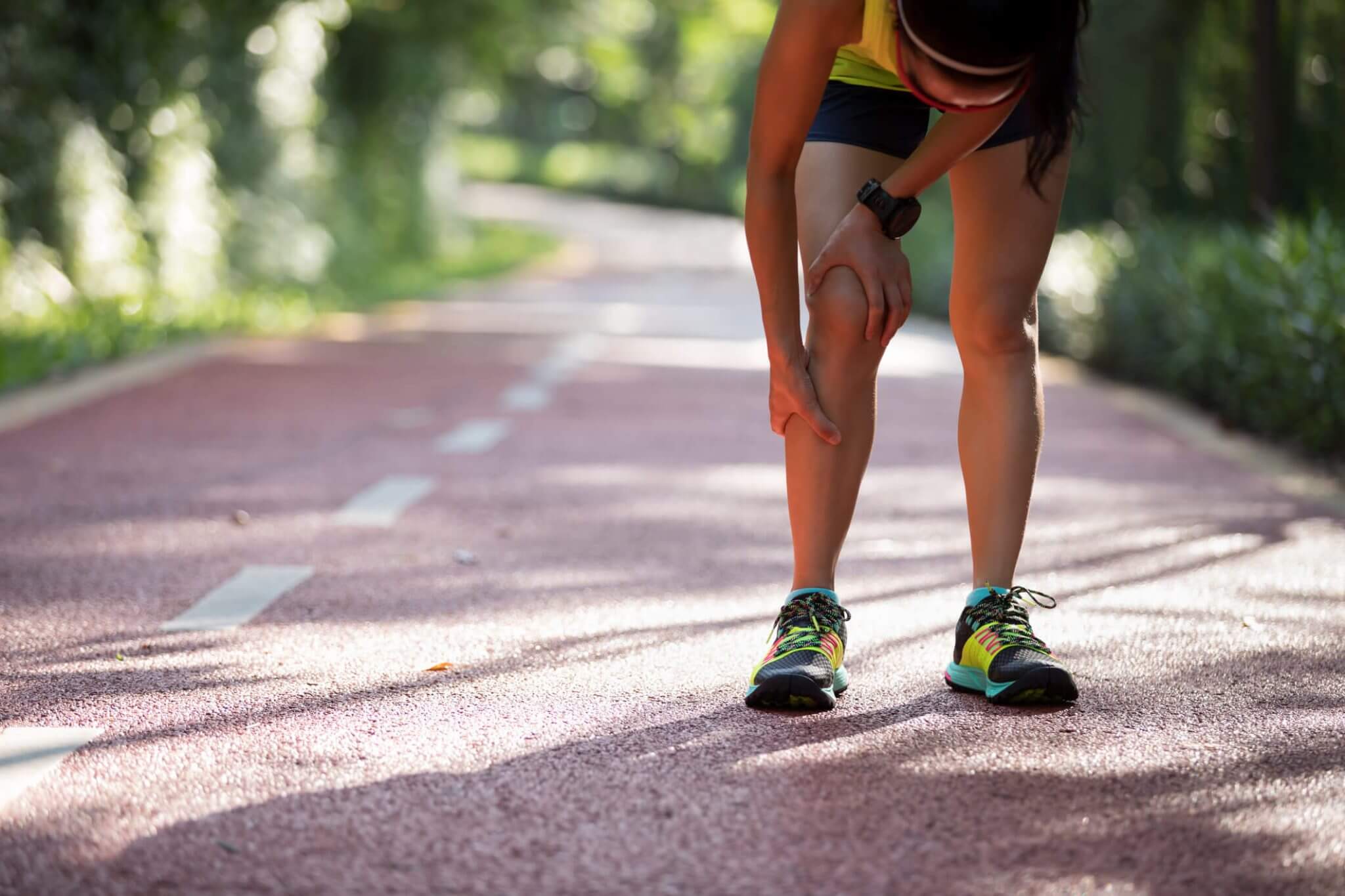 Woman Feeling pain in her legs