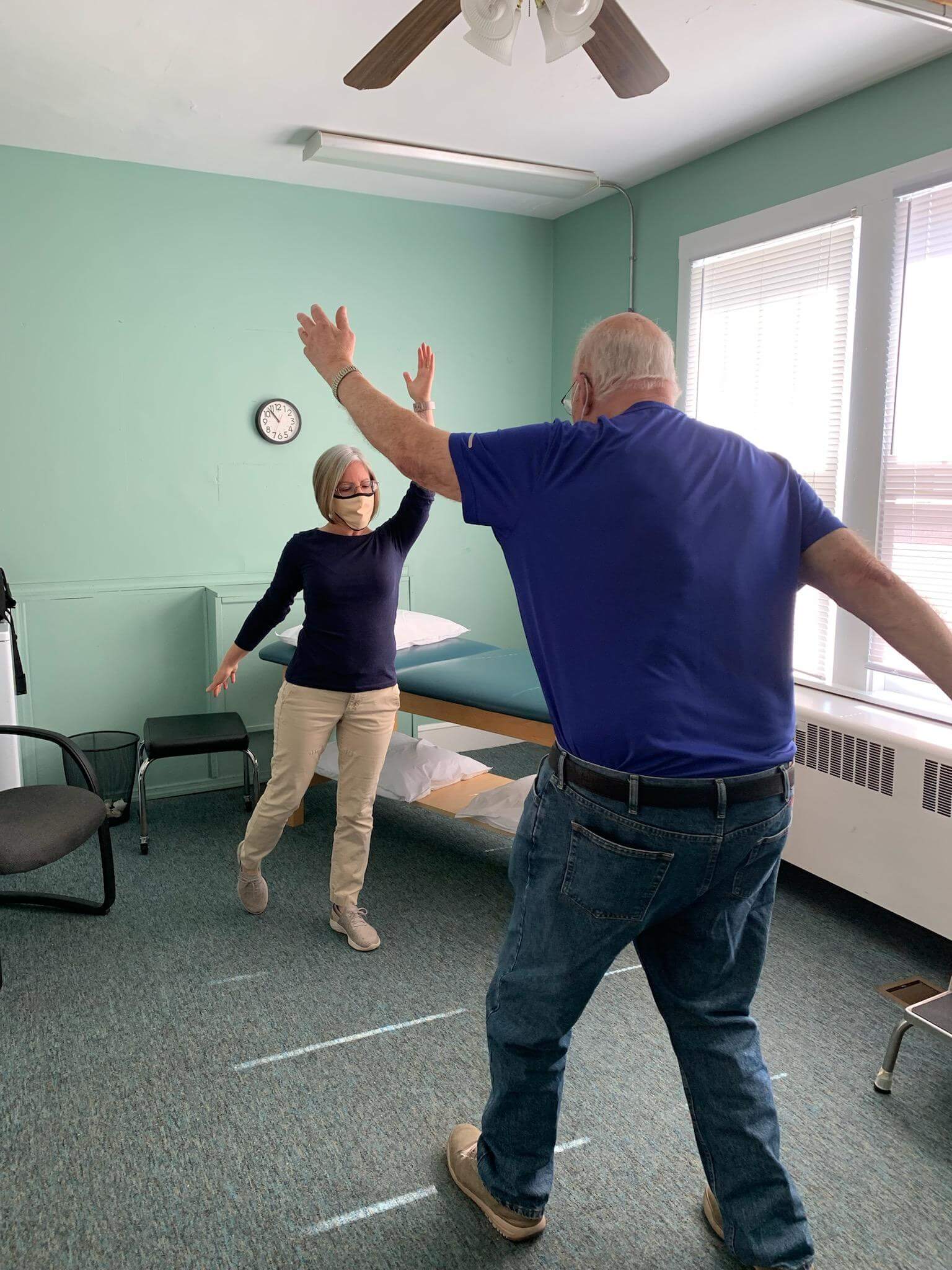 physical therapist working with a patient on balance in floyd va
