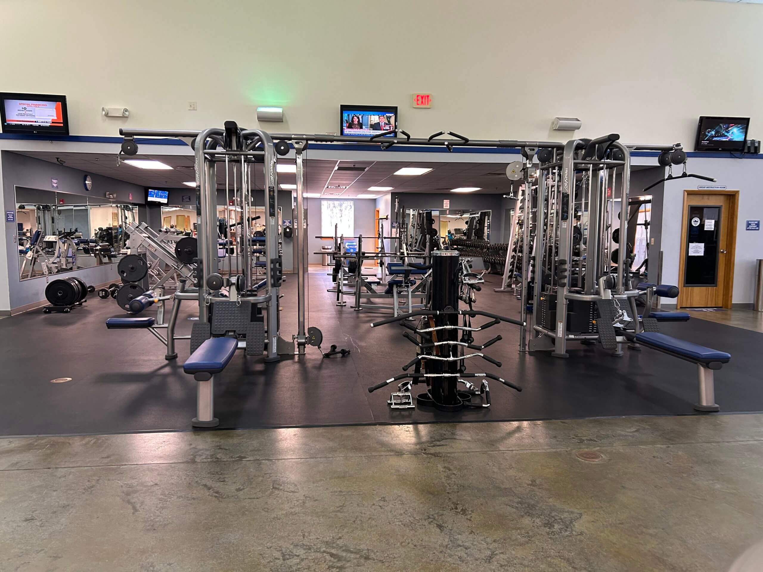 man exercising with dumbells 