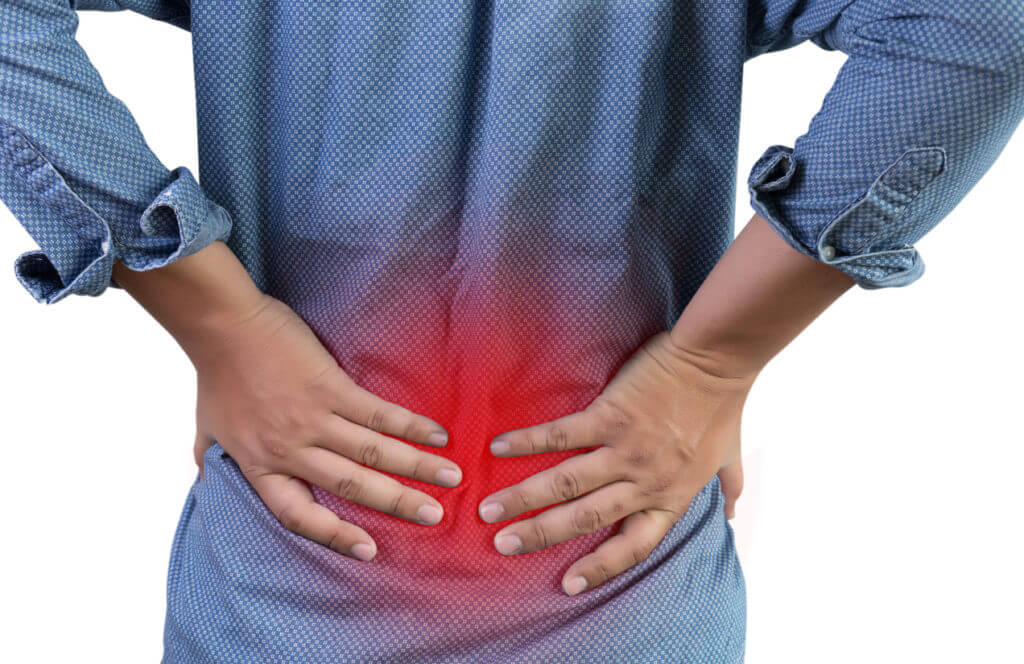 A man showing signs of lower back pain