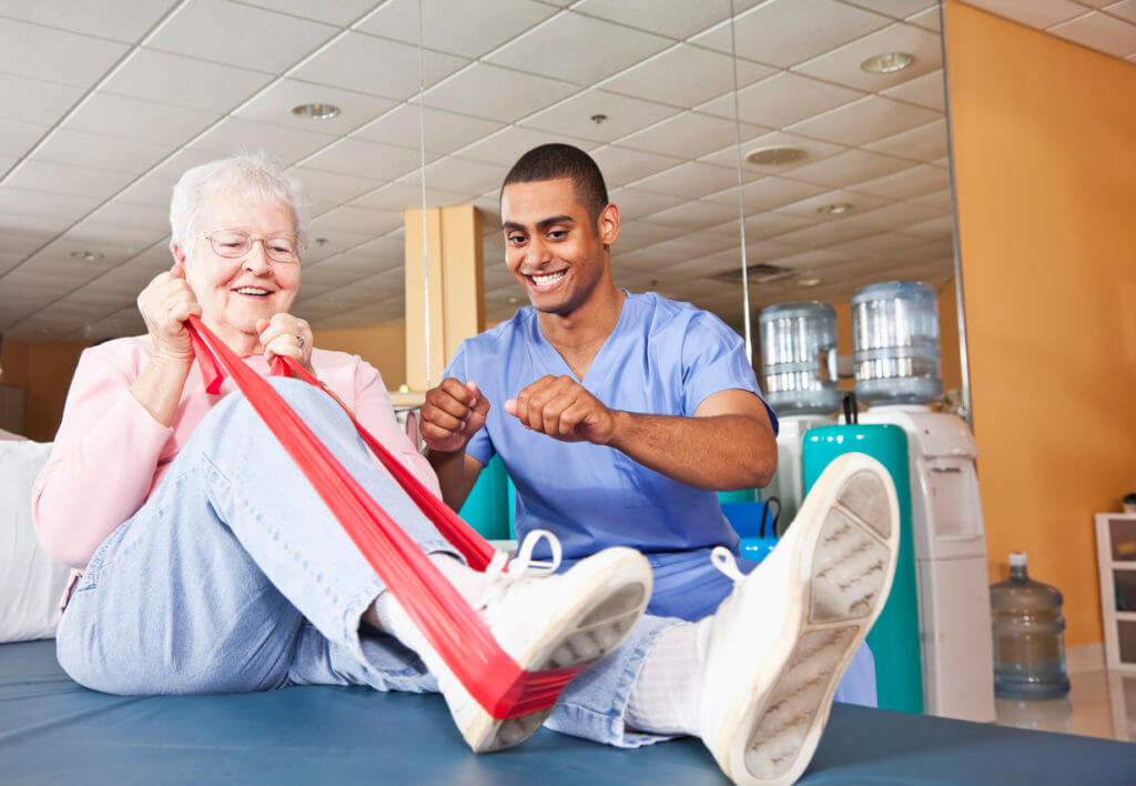 Occupational therapist works with an elderly woman