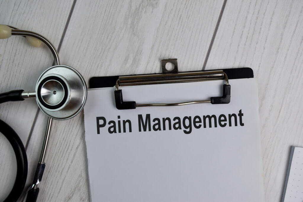 Pain Management text write on a paperwork isolated on office desk
