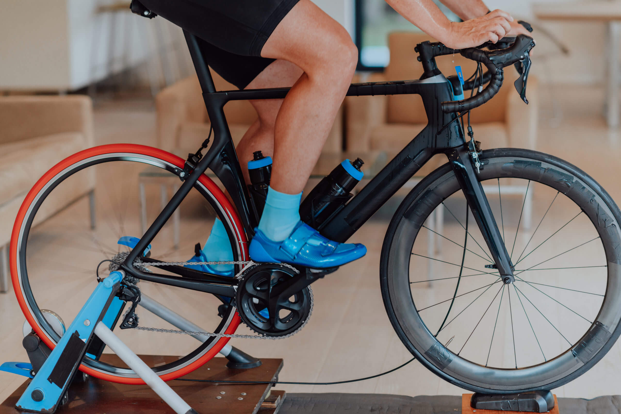 cyclist on his bike during a physical therapy bike fitting