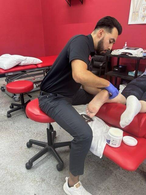 physical therapy today therapist treating lower body injury