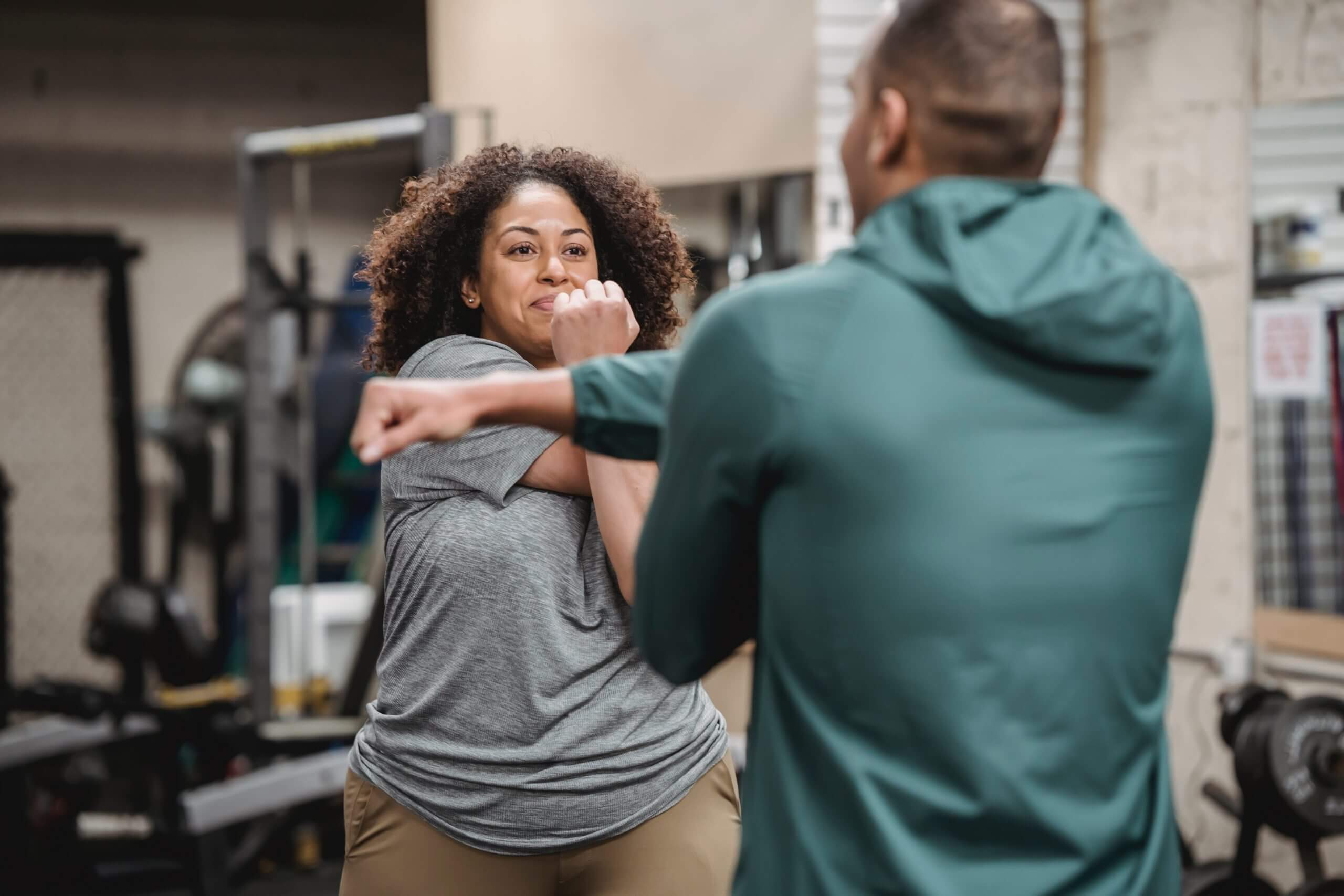 physical therapist working with gym member in spring branch tx