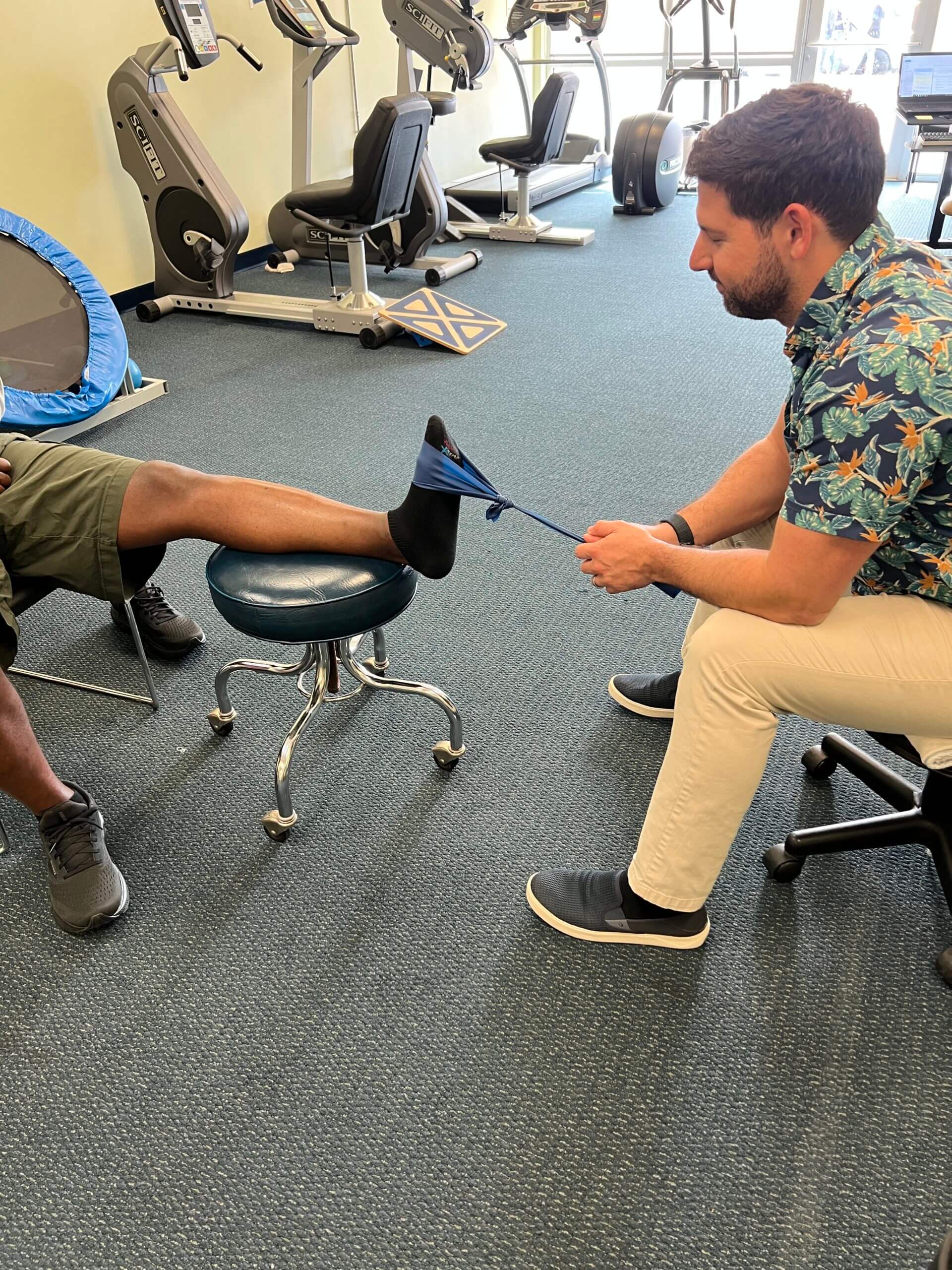 Physical therapy back pain exercises demonstrated by H2 Health specialist for herniated disc treatment