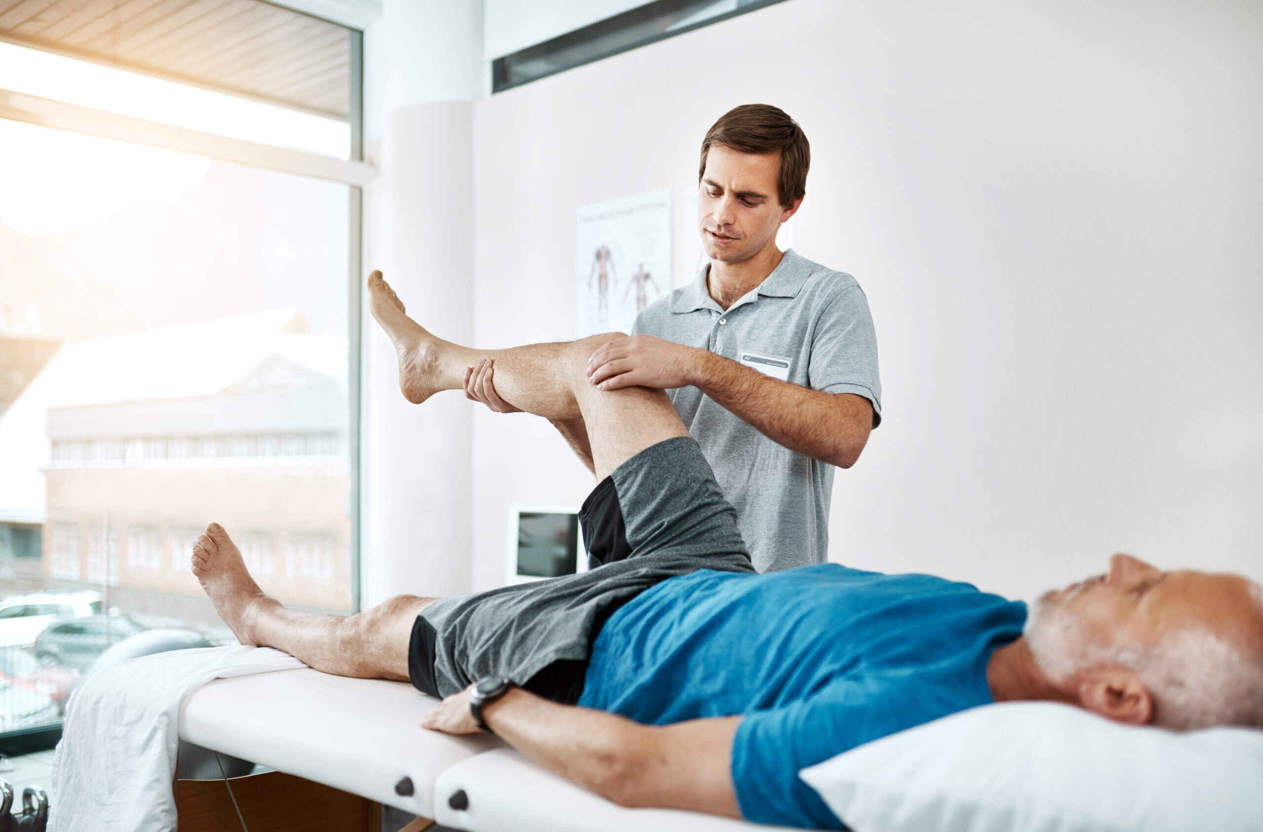 physical therapist working with a patient on flexibility in Buda TX
