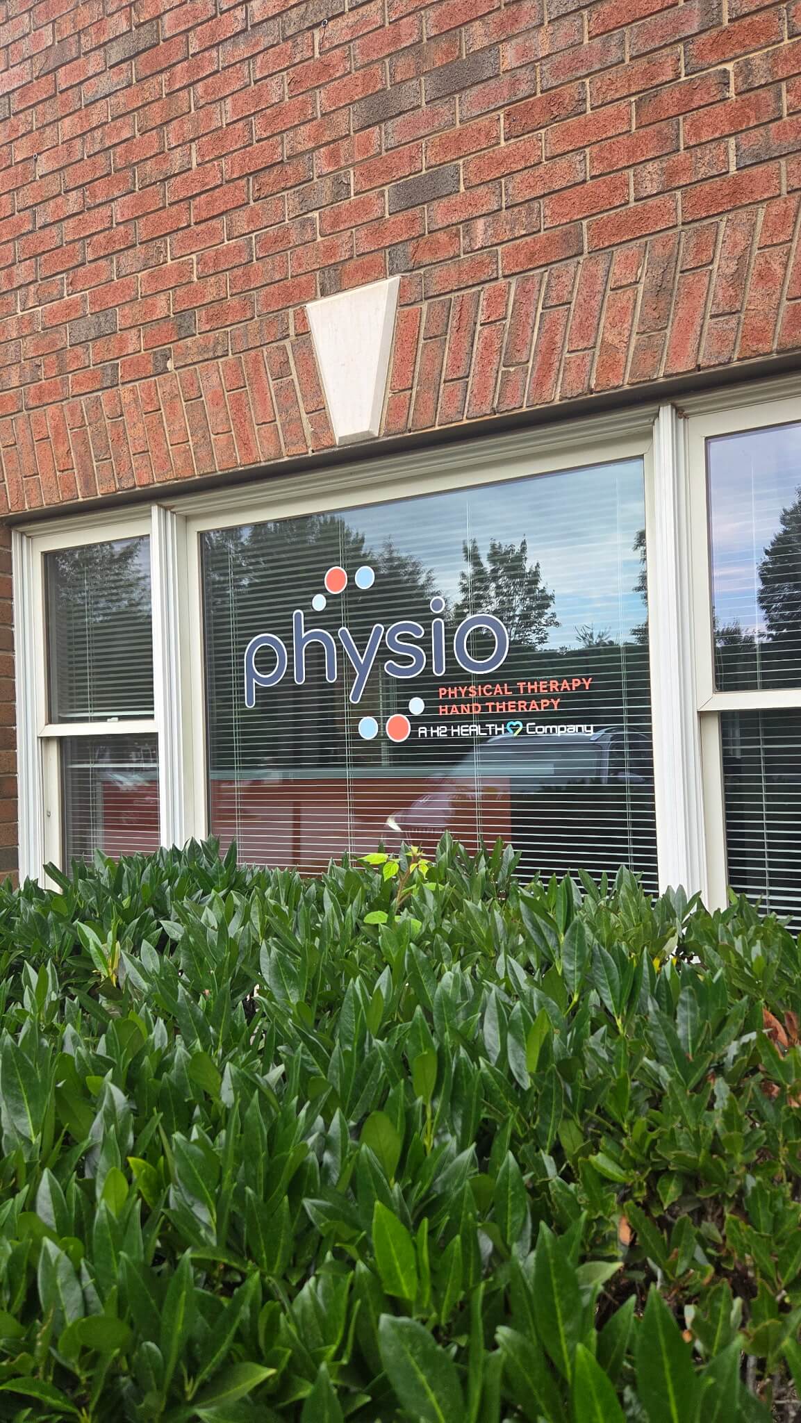 physio physical therapy clinic front entrance sign
